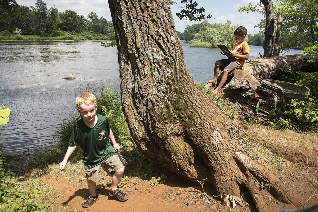 Young boys playing by St. Croix River. (Photo: Dawn Kish, NPF)